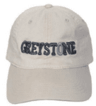A white hat with the word " greystone ".