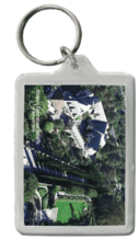 A key chain with an aerial view of a building.
