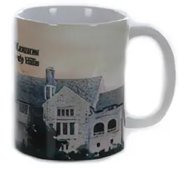 A coffee mug with an image of the old building.